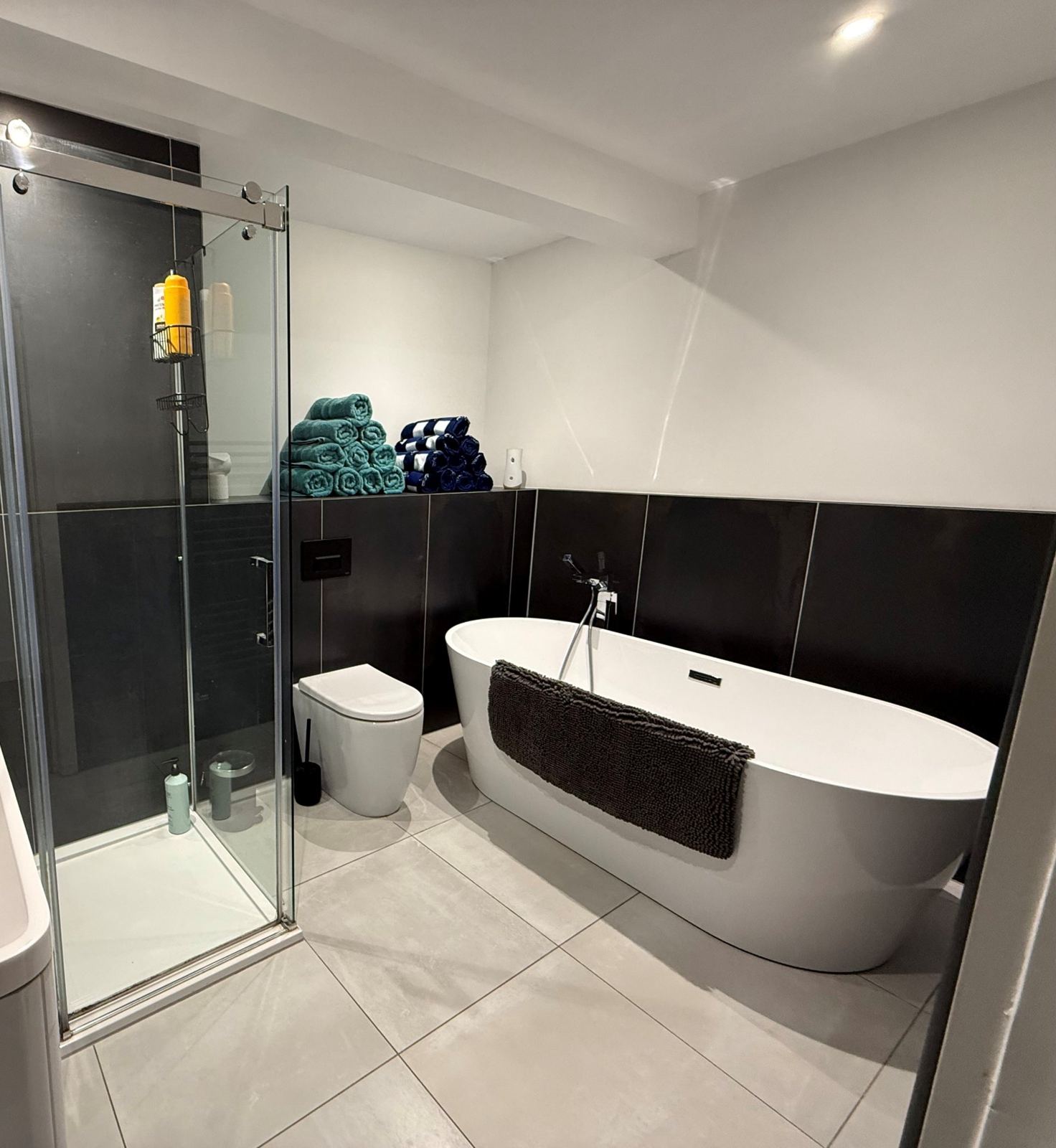 Family bathroom with a freestanding bath and a walk-in shower